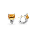 Pair of earrings with citrine gemstones on a white background