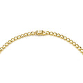 Gold beaded necklace clasp on a white background
