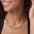 Woman wearing the Tiger Eye & Sterling Silver Station Necklace