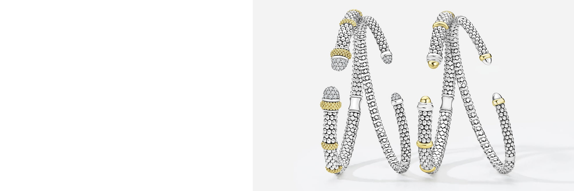 Set of silver and gold beaded versa bracelets on a white background