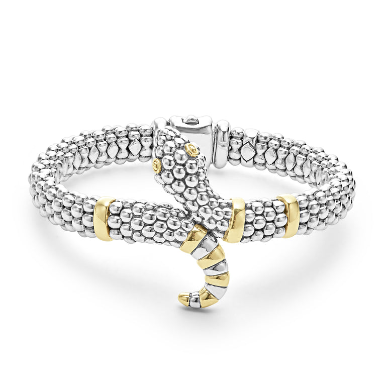 Sterling silver Caviar beading highlighted by 18k gold form this unique snake bracelet.