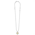 Signature Caviar G Initial Charm Necklace features sterling silver ball chain, a yellow-gold engraved g pendant, heart charm, and LAGOS bar accent.