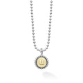 Signature Caviar U Initial Charm Necklace featuring a sterling silver ball chain and 18K gold pendant with caviar beading and a raised u.