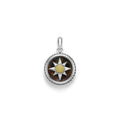Pietersite gemstone surrounded by sterling silver and 18K gold Caviar beading forms this small circle burst amulet.