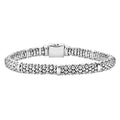 Silver bracelet with a clasp on a white background