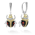 A LAGOS exclusive. Onyx with diamond, 18K gold and sterling silver accents forming these beetle drop earrings. Ideal to pair with other signature Rare Wonder designs.