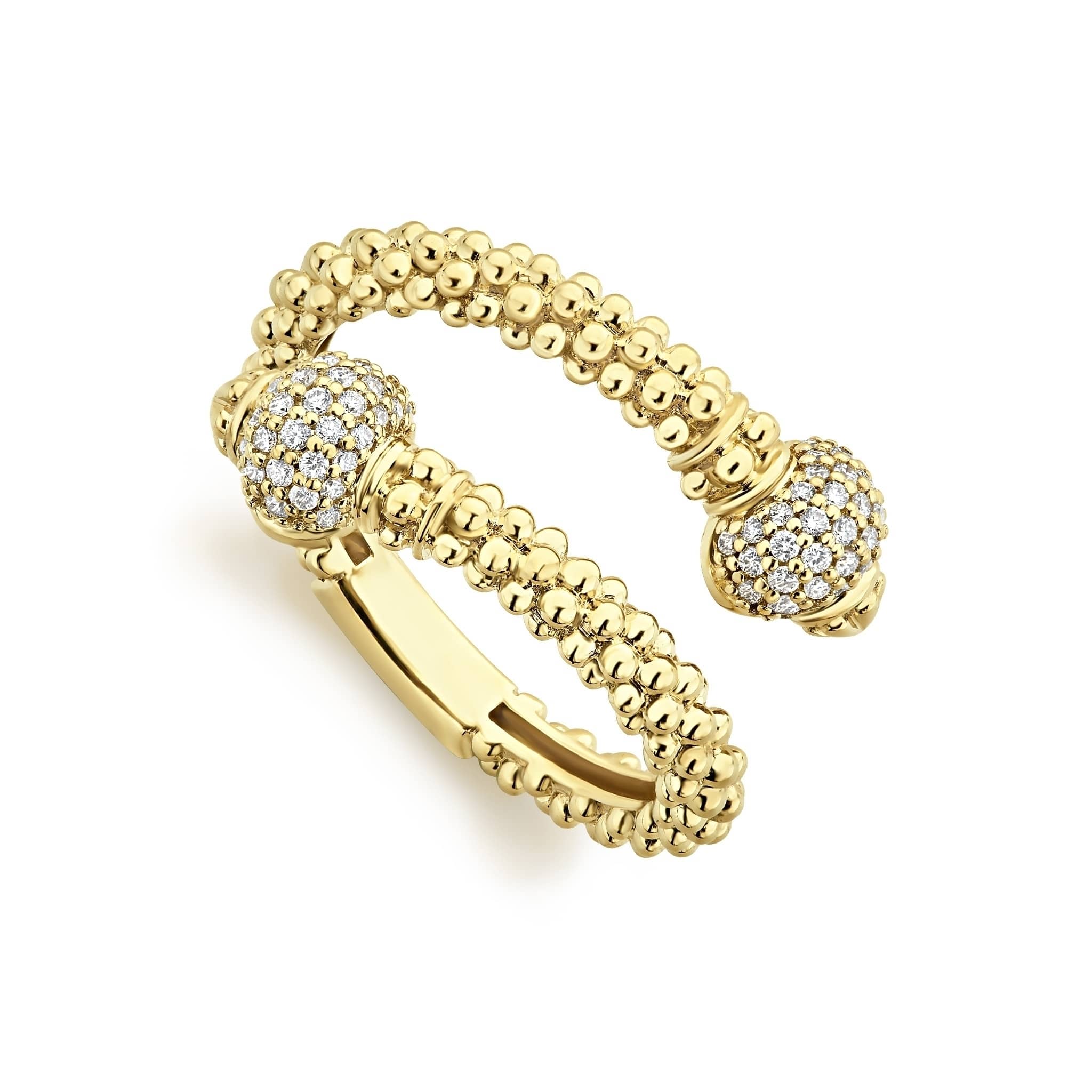 Diamonds surrounded by 18K gold form this wrap ring finished on a band of Caviar beading. LAGOS diamonds are the highest quality natural stones.