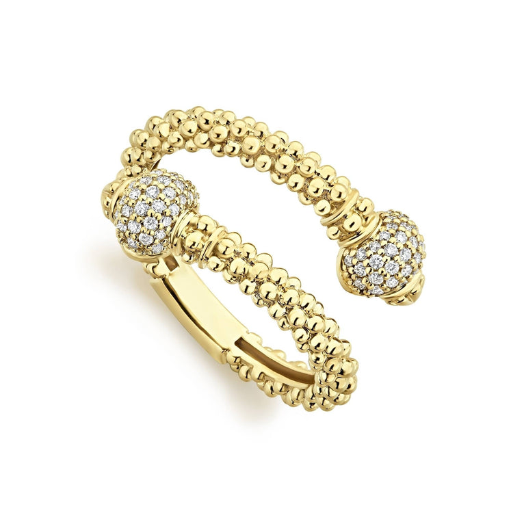 Diamonds surrounded by 18K gold form this wrap ring finished on a band of Caviar beading. LAGOS diamonds are the highest quality natural stones.