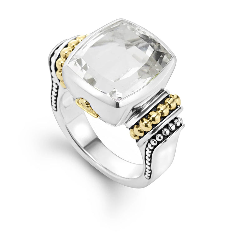 White topaz bezel-set gemstone ring with 18K gold Caviar beading on a sterling silver band.