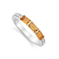 Three citrine gemstones form this stacking ring surrounded by sterling silver Caviar beading.