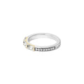 Rittenhouse White Topaz Stacking Ring in polished silver features baguette-cut white topaz, 18K gold accents, and Caviar beading for elegant, modern shine.