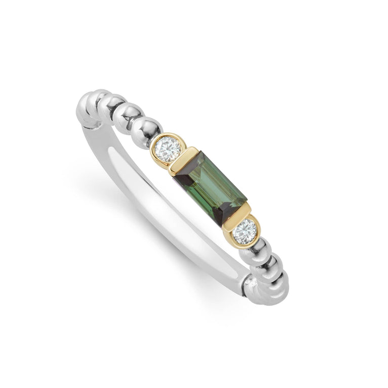 Green tourmaline gemstone with diamonds form this stacking ring surrounded by 18K gold and sterling silver Caviar beading. LAGOS diamonds are the highest quality natural stones.
