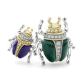 Rare Wonders Jade Double Beetle Diamond Ring featuring mixed metal scarab motifs in 18K gold, sterling silver, and gemstones, showcasing LAGOS's craftsmanship.