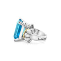 Glacier Large Emerald-Cut Swiss Blue Topaz Ring in sterling silver with 18K gold Caviar beading, featuring a large emerald-cut blue gemstone and LAGOS stamp.