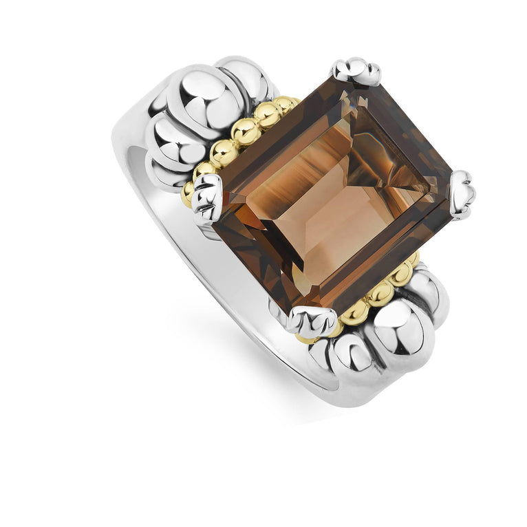 The return of a LAGOS icon. Our signature emerald-cut smokey quartz gemstone ring with a prong setting in sterling silver and 18K gold Caviar beading.