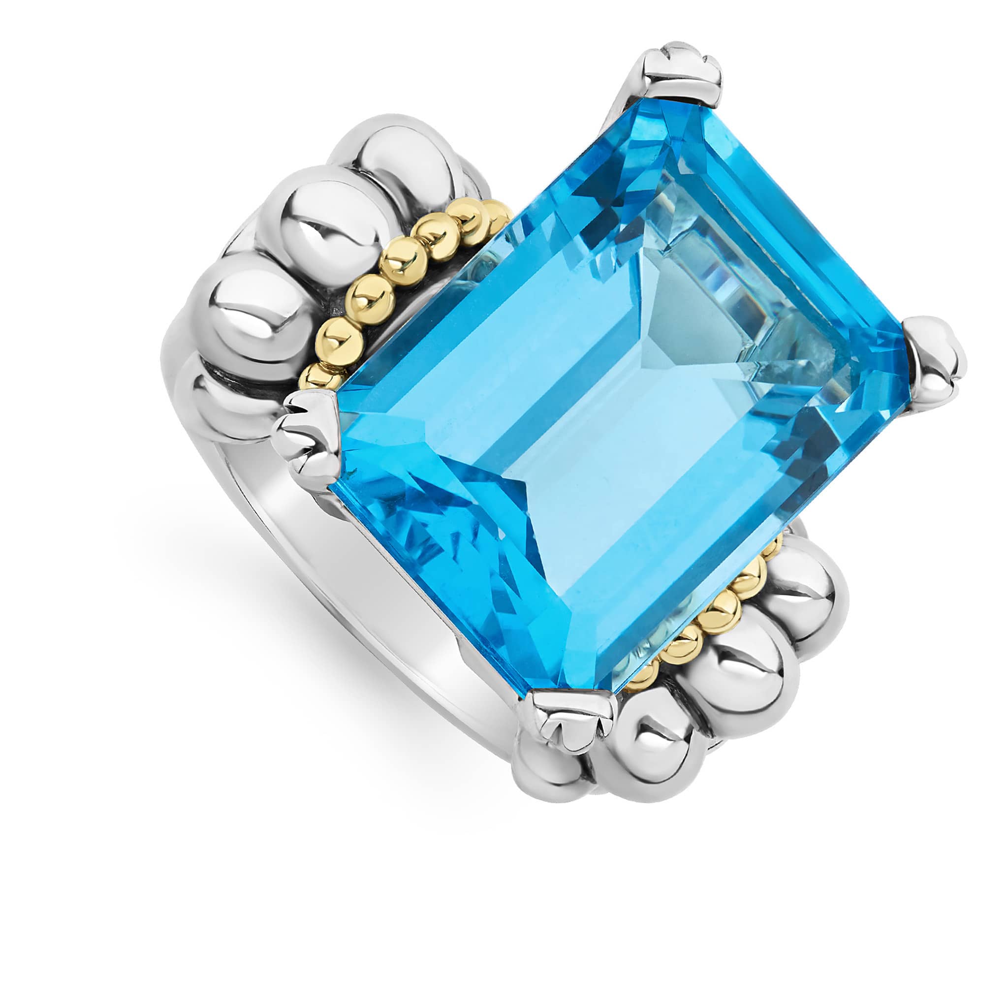 The return of a LAGOS icon. Our signature emerald-cut swiss blue topaz gemstone ring with a prong setting in sterling silver and 18K gold Caviar beading.