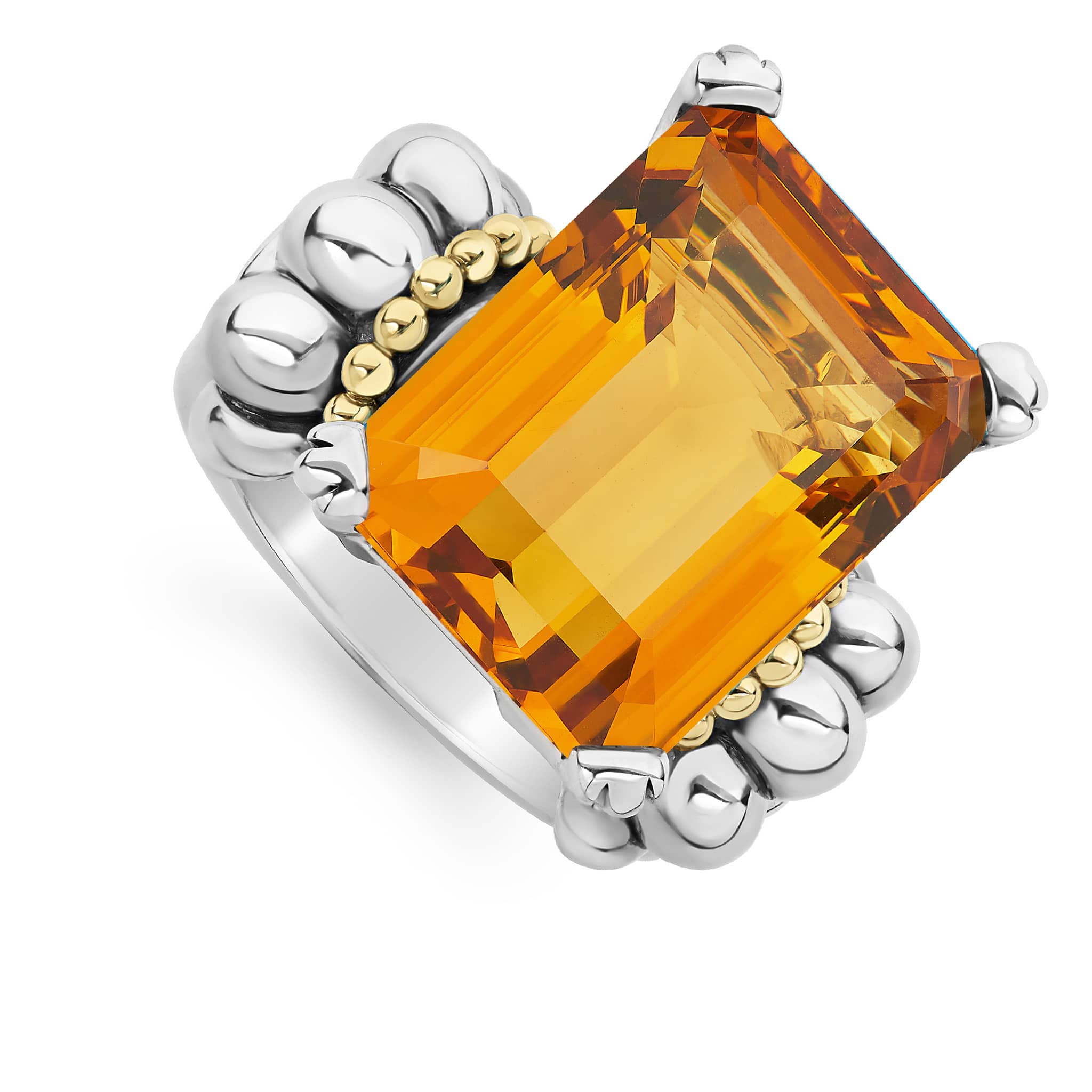 The return of a LAGOS icon. Our signature emerald-cut citrine gemstone ring with a prong setting in sterling silver and 18K gold Caviar beading.