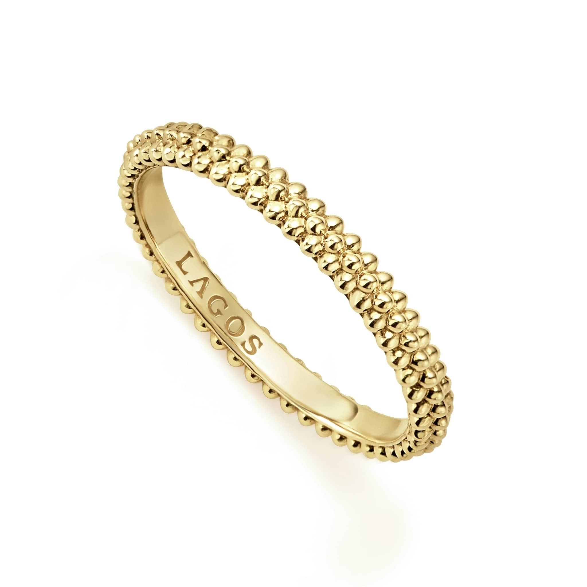 An 18K gold Caviar beaded stacking ring. Perfect to layer with other rings.