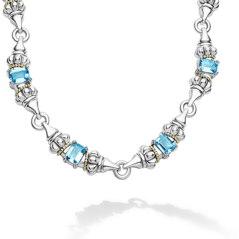 Ten emerald-cut swiss blue topaz gemstones with a prong setting in sterling silver and 18K gold Caviar beading form this necklace.