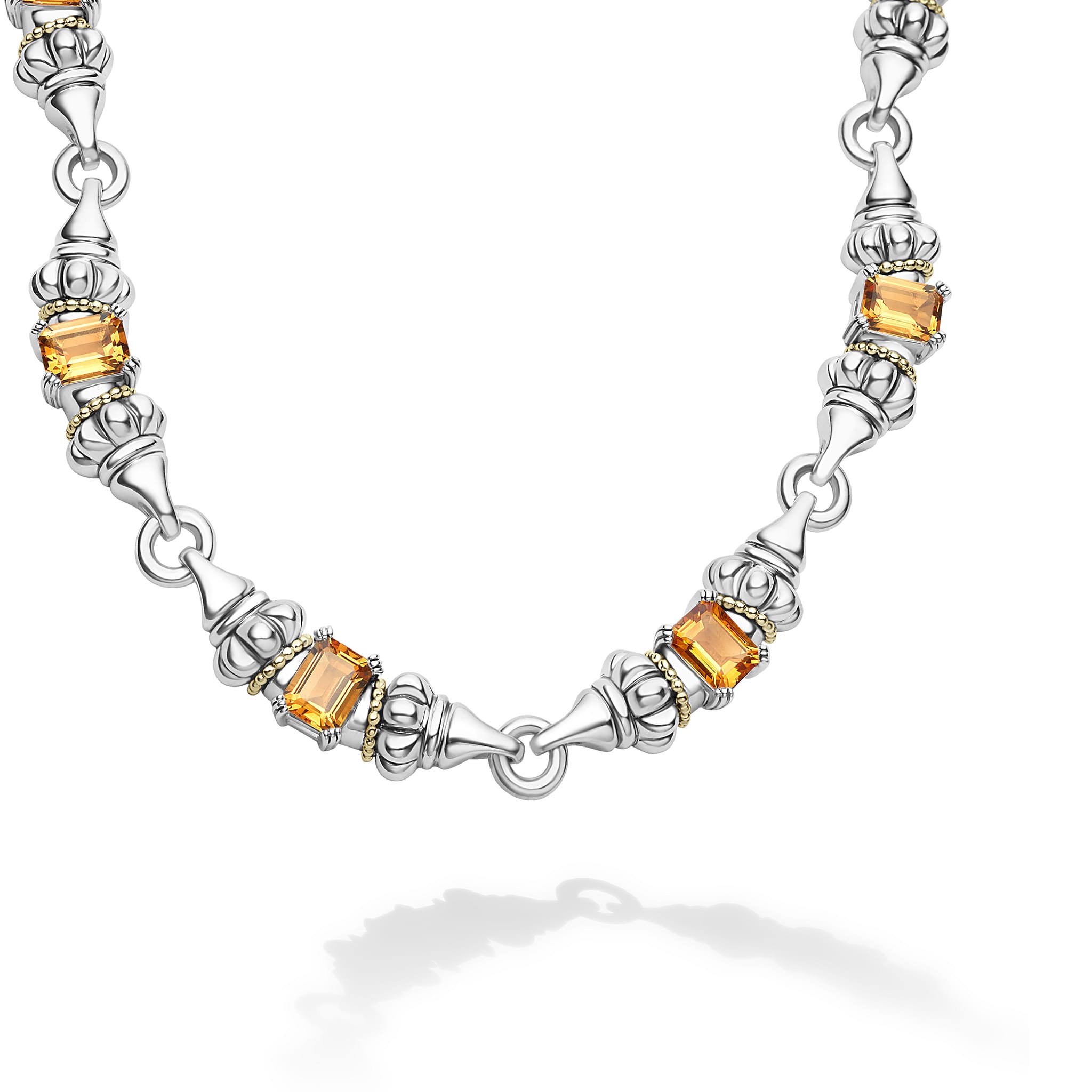 Ten emerald-cut citrine gemstones with a prong setting in sterling silver and 18K gold Caviar beading form this necklace.