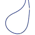 Lapis gemstone beaded necklace with Caviar beading and fluted accents. Gemstones are natural with unique hues. Variations from the colors shown make each necklace unique.