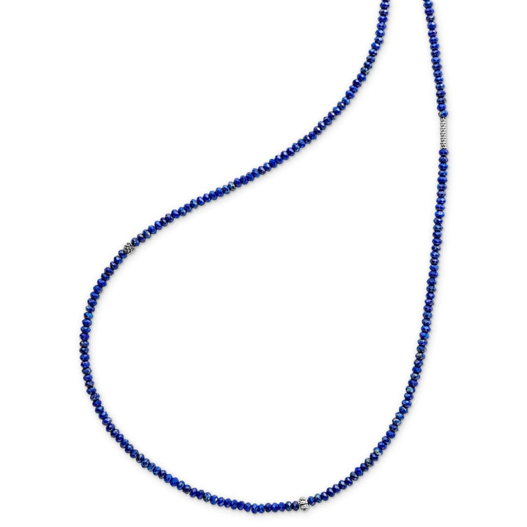 Lapis gemstone beaded necklace with Caviar beading and fluted accents. Gemstones are natural with unique hues. Variations from the colors shown make each necklace unique.