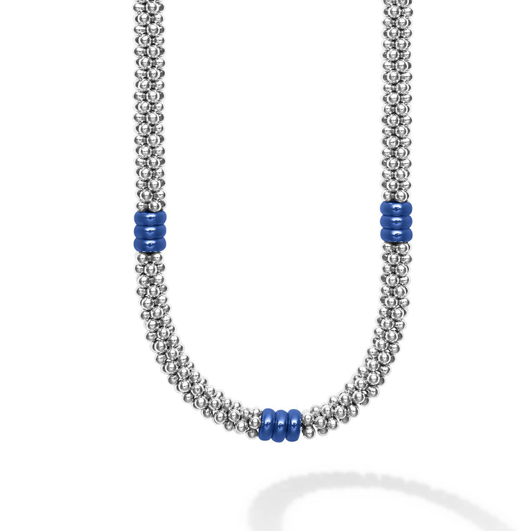 A sterling silver Caviar beaded necklace with nine ultramarine ceramic stations.