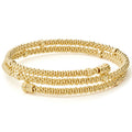18k gold Caviar beaded coil bracelet with smooth stations form this coil bracelet.