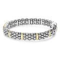 Signature Caviar Yellow Sapphire Caviar Bracelet: Close-up of a caviar silver bracelet with 18K gold accents and pavé yellow sapphire gemstone stations, showcasing LAGOS craftsmanship.