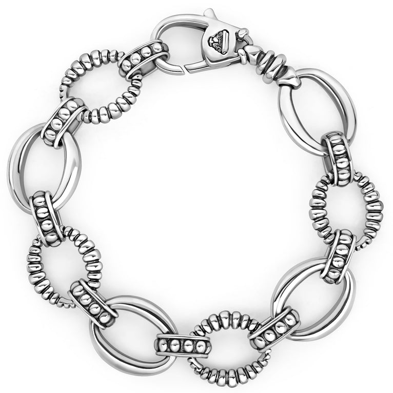 Smooth and fluted links of polished sterling silver form this versatile bracelet.Additional sizes may be available. Please contact customercare@lagos.com or call 877-925-4305.