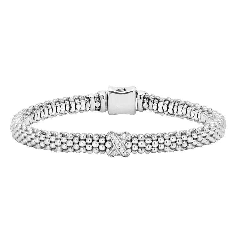 A sterling silver diamond X station wraps this sterling silver Caviar beaded bracelet. LAGOS diamonds are the highest quality natural stones.