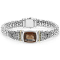 Smokey quartz bezel-set gemstone and sterling silver Caviar beading with 18K gold detailing forms this bracelet.