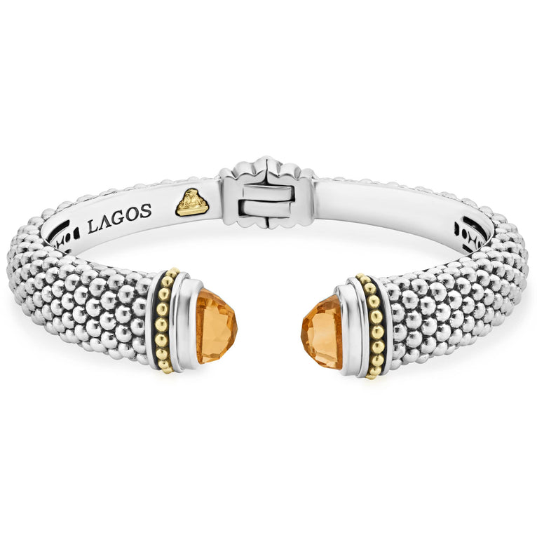 Expertly crafted Caviar beading with highly polished sterling silver stations comprise this innovative bracelet detailing citrine gemstone end caps. Finished with a hinge clasp.