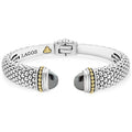 Expertly crafted Caviar beading with highly polished sterling silver stations comprise this innovative bracelet detailing hematite gemstone end caps. Finished with a hinge clasp.