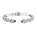 Caviar beading and highly polished sterling silver stations comprise this innovative cuff bracelet detailing onyx gemstone end caps.