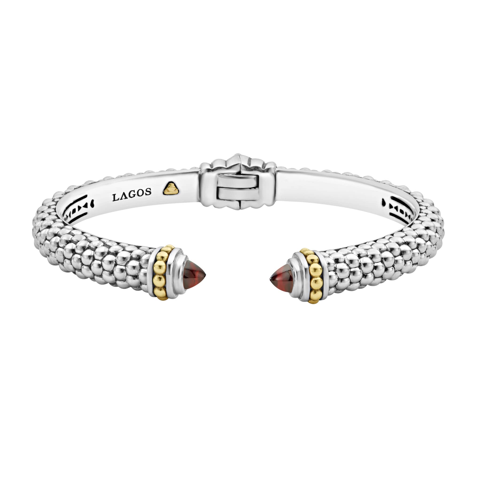 Caviar beading and highly polished sterling silver stations comprise this innovative cuff bracelet detailing garnet gemstone end caps.
