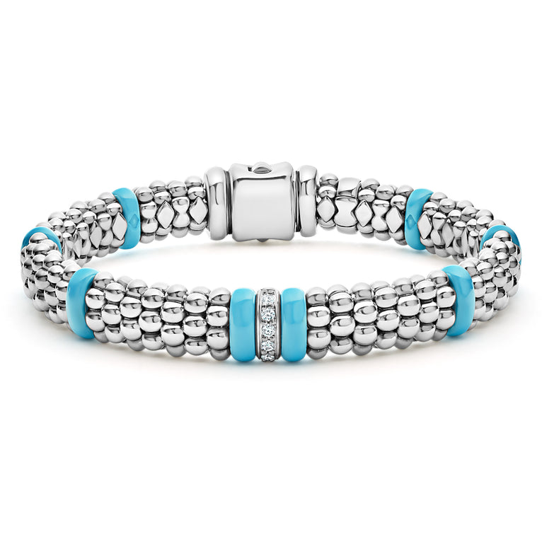A single diamond station set in sterling silver surrounded by blue ceramic and Caviar beading. LAGOS diamonds are the highest quality natural stones.