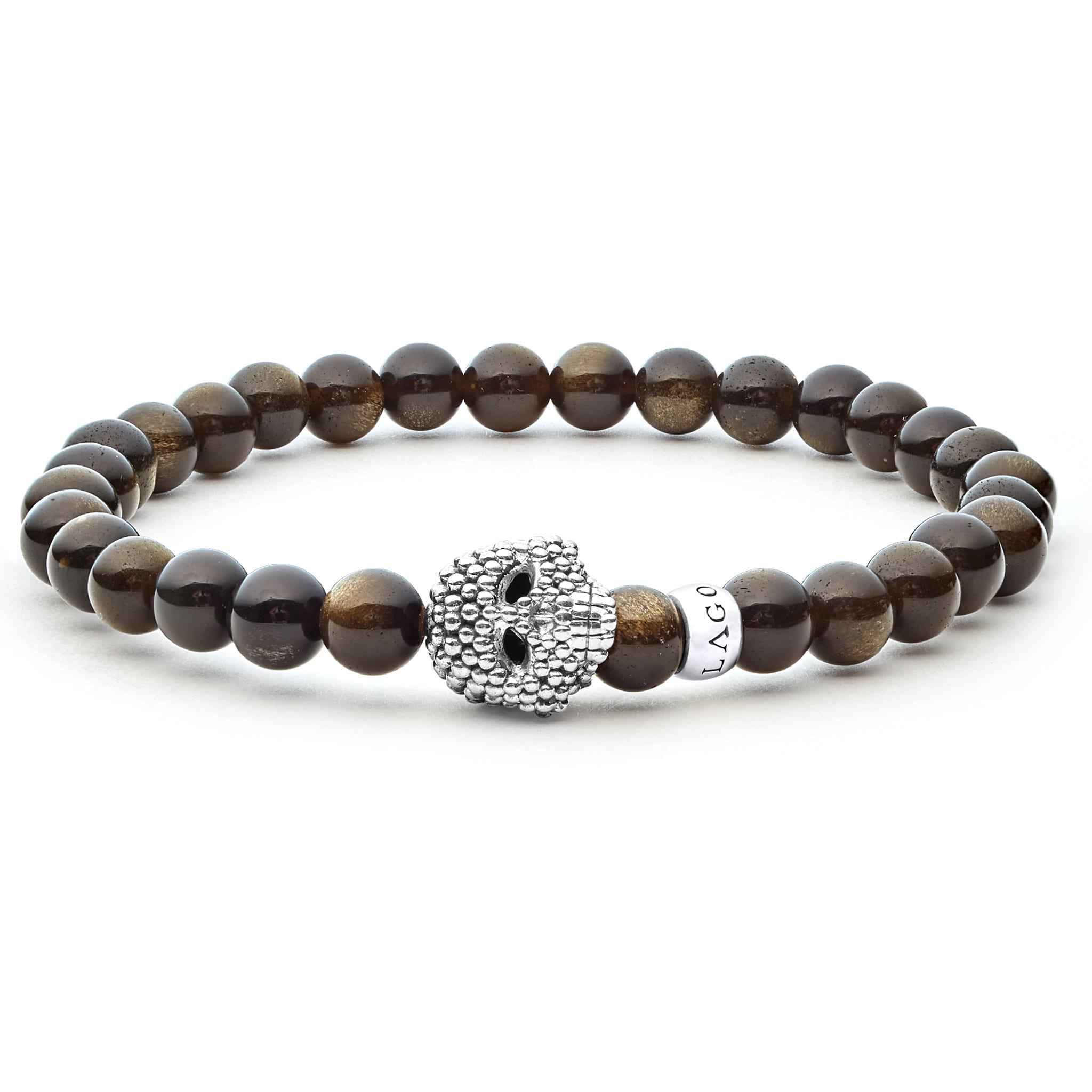 Golden obsidian gemstone beaded bracelet with a sterling silver Caviar skull.