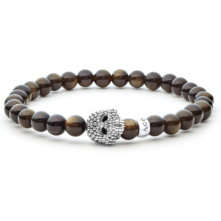 Golden obsidian gemstone beaded bracelet with a sterling silver Caviar skull.
