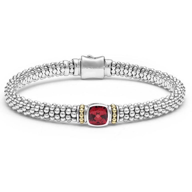 A rhodolite garnet gemstone and sterling silver Caviar beading with 18K gold detailing forms this bracelet.
