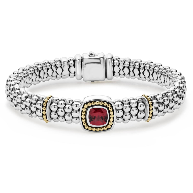 A rhodolite garnet gemstone and sterling silver Caviar beading with 18K gold detailing forms this bracelet.
