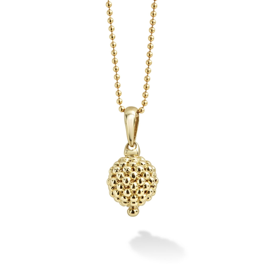 Signature Caviar beading surrounds this 18K gold pendant paired with an 18K gold ball chain necklace.