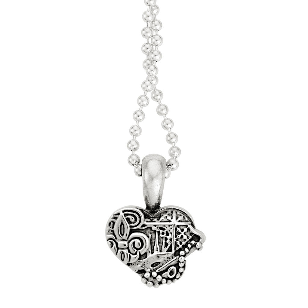 A sterling silver heart which showcases architectural landmarks and cultural icons of New Orleans finished on a ball chain necklace.