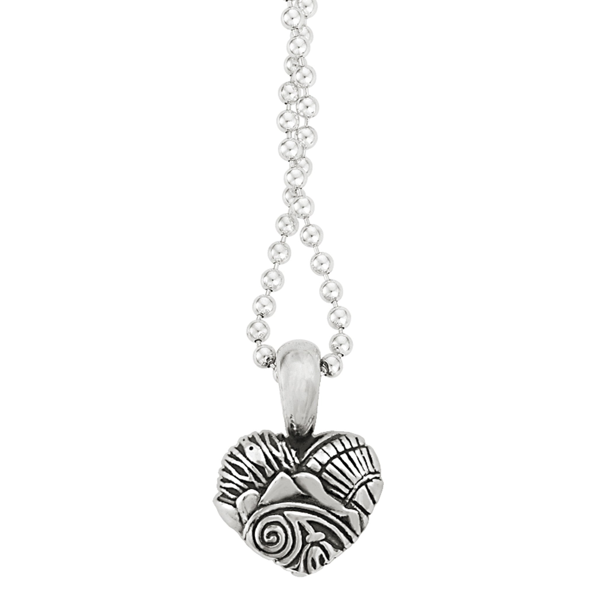 A sterling silver heart pendant detailing architectural and cultural icons of Seattle finished on a sterling silver ball chain.