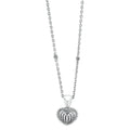 Beloved Fluted Heart Pendant Necklace features a sterling silver heart with ribbed concentric motif and caviar beading, on a chain with beaded accents.