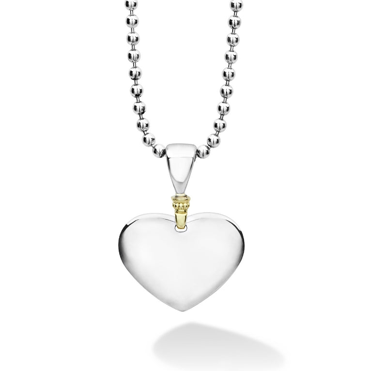 A LAGOS exclusive. Highly polished sterling silver heart necklace with 18K gold beading. Ideal for a modern initial or classic monogram.