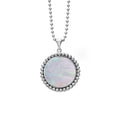 Mother of pearl gemstone pendant framed by sterling silver Caviar beading finished on a sterling silver ball chain necklace.