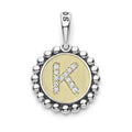 A LAGOS exclusive. Our Signature Caviar sterling silver and 18K gold initial 'K' charm accented with diamonds. Charm can only be paired with chains 04-80756-ML, 04-80549-ML, 04-80946-ML or 04-10534-ML. Chain sold separately. LAGOS diamonds are the hi