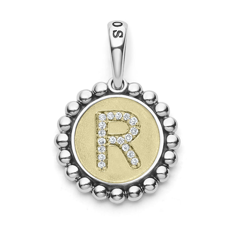 A LAGOS exclusive. Our Signature Caviar sterling silver and 18K gold initial 'R' charm accented with diamonds. Charm can only be paired with chains 04-80756-ML, 04-80549-ML, 04-80946-ML or 04-10534-ML. Chain sold separately. LAGOS diamonds are the hi