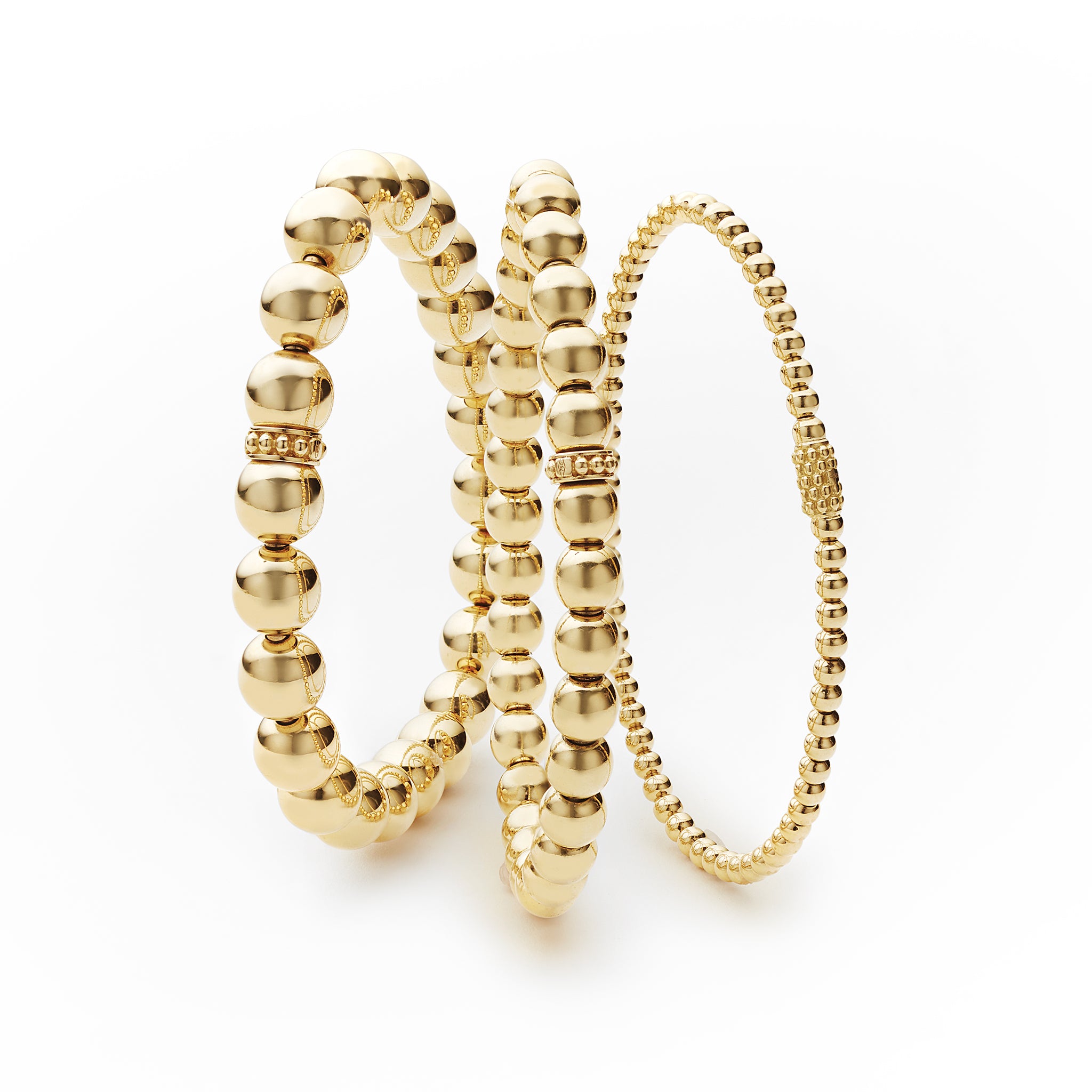 Three 18K gold signature Caviar beaded bracelets from our Caviar Gold collection. 18K Gold Slip On Style Stretch fit accommodates most wrist sizes Bracelets displayed in 3mm, 6mm, and 8mm
